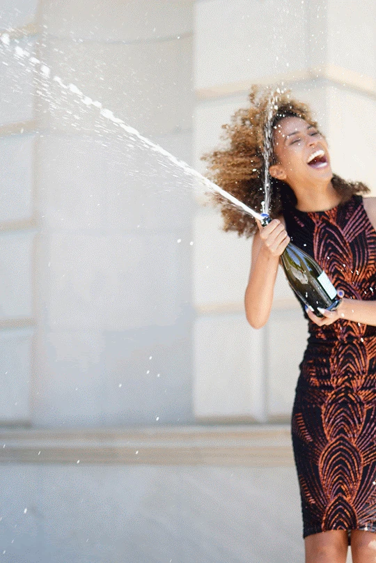 A sequence of Claire’s graduation celebration with champagne.